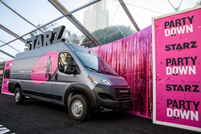 In a fun photo moment, an identical replica of the Party Down Catering van from the show was parked on the carpet.