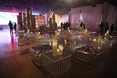 In the main bar, a cloudlike back bar structure crafted from white metal grid panels was complemented by organic sculptures and comfortable seating arrangements.