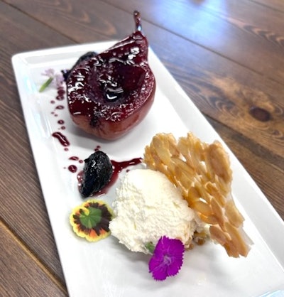 Another highlight of Proof of the Pudding's fall menu? Port-poached pear, caramelized fig, Frangelico cream, and an almond crisp.