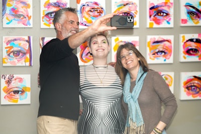 On Wednesday night, Piper hosted Party with a Purpose at Kimpton Angler’s Hotel to mingle with fans, posing in front of the newest volume of her 'SEEN' collection, which features 50 eye paintings from an open call Piper organizes each year. To participants, she poses the question: What does it mean to feel seen? Guests could also enter a raffle benefiting Lotus House Women's Shelter for various prizes offered by Piper and Kimpton Angler’s Hotel.