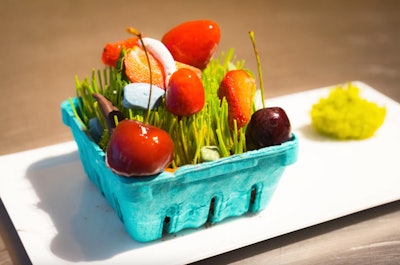 At a fundraiser for Advocate Illinois Masonic Medical Center, caterer Blue Plate created a five-course dinner inspired by how a child with autism experiences the world. One course was called 'Things Aren’t Always As They Seem.' It was meant to surprise the guests, with cheese molded to resemble summer fruits, pumpernickel “dirt,” chocolate-covered “grasshoppers,” edible “pebbles,” and grilled bread.