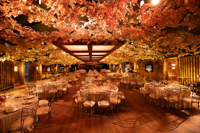 Guests at the viewing party enjoyed a seated meal under a canopy of lush leaves. Avenge Creative worked with vendors including Unmatched Lighting, Jackson Shrub Supply, Event Carpet Pros Inc., GifCube, Town & Country Event Rentals, and Stitch. See more: Golden Globes 2025: See Inside the Award Show, Plus How the Wildfires Are Affecting Other Hollywood Events