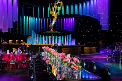 The gala was also divided into eight “colorblocked” areas, each reflecting a different hue via specific color choices of tablecloths, napkins, carpeting, lighting, and florals—470 floral arrangements, to be exact. CJ Matsumoto & Sons handled florals, which included hundreds of anthuriums, phalaenopsis, and lilies painted a coral blue.