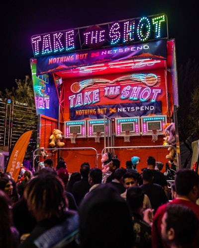 It’s no doubt that Shaq’s Fun House is, as the iconic basketball star wanted, an event for the people. “An all-inclusive ticket affords guests six hours of a premium open bar, thanks to partners like Casamigos and Anhauser Busch,” Silberzweig said, adding that “we’ve got a full carnival [too], which featured the ‘Nothing but NETspend’ basketball game and Netspend Ferris Wheel, [as well as] the Electrolit slide, and a carousel.” It doesn’t end there—a tented area also featured a concert area with VIP tables in partnership with Wynn. “This year we had Snoop Dogg headline. It was insane in the best way possible,” the Medium Rare co-CEO said.