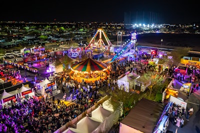 “This year, the ambition of Shaq’s Fun House as a carnival and concert was fully realized,” Silberzweig said when reflecting on the guest experience. “It was custom-built and designed from the ground up” with the staples everyone knows and loves about a classic carnival, like the “big-top circus tent,” which Silberzweig added was “shipped in via cargo ship to house 5,000 people for a Snoop Dogg and Diplo mega-show.”